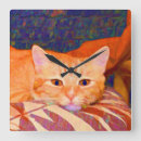 Recherche de chat tigré orange horloges Chats