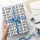 Recherche de chiffre papier cadeau Pour elle