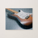 Recherche de musical instrument puzzles Instrument à chaîne