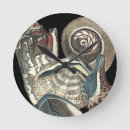 Recherche de coquillage horloges Coquille