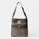 Recherche de poupée sacs Mignon