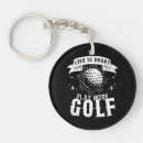 Recherche de joueur de golf porteclés Disque