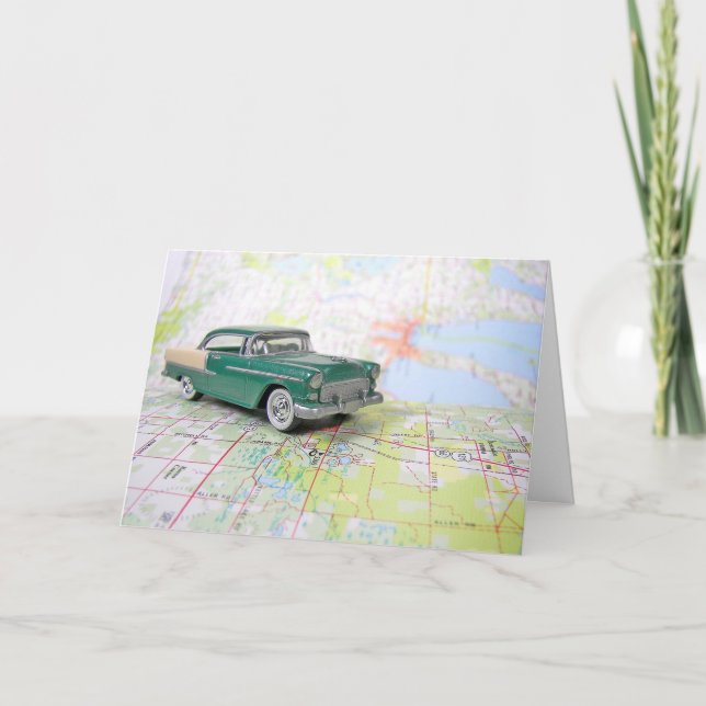 1955 : Une voiture sur une carte routière (Devant)