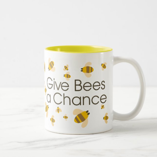 2 Couleurs Donnez à des abeilles une tasse d'occasion (Droit)