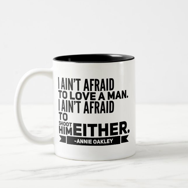 2 Couleurs Tasse de café de citation d'Annie Oakley (Gauche)