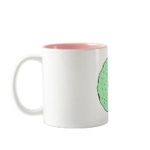 Tasse verte de beignet