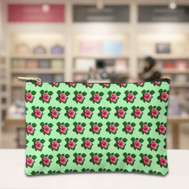 À Accessoires Motif sans couture de rose rose sur pochette vert  (Light green pouch with seamless pattern of a pink rose)