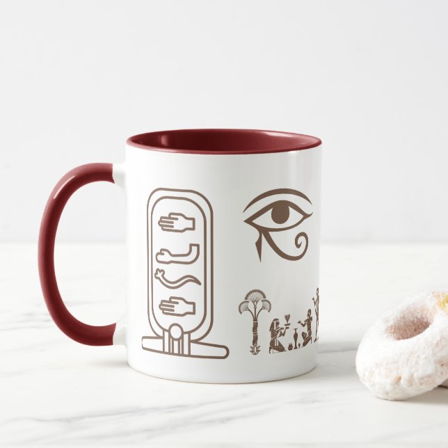 A ceramic mug with an ancient Egyptian design  (Avec donut)