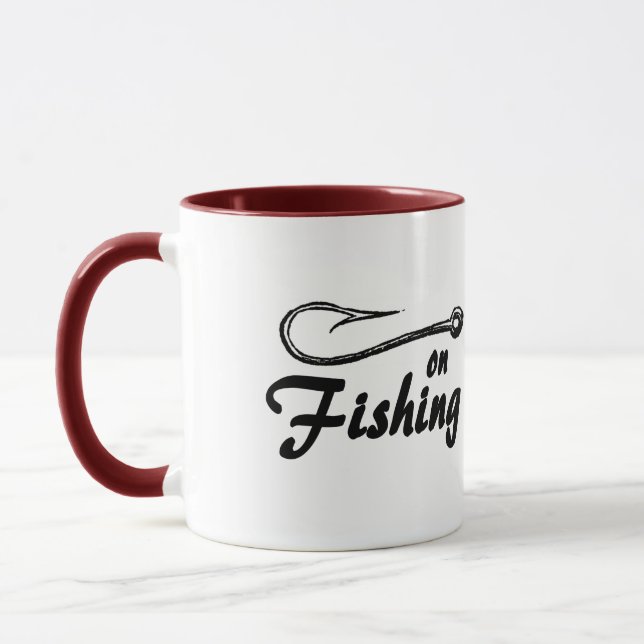 Accroché sur la tasse de pêche (Gauche)
