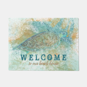 Accueil au tapis de porte de Chambre d'OurBeach
