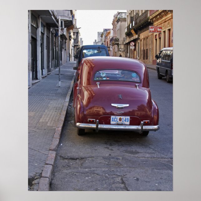 Affiche A classic old red Peugeot car parked on a street (Devant)
