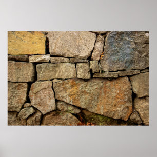 Affiche A stone wall made of cobblestones background textu