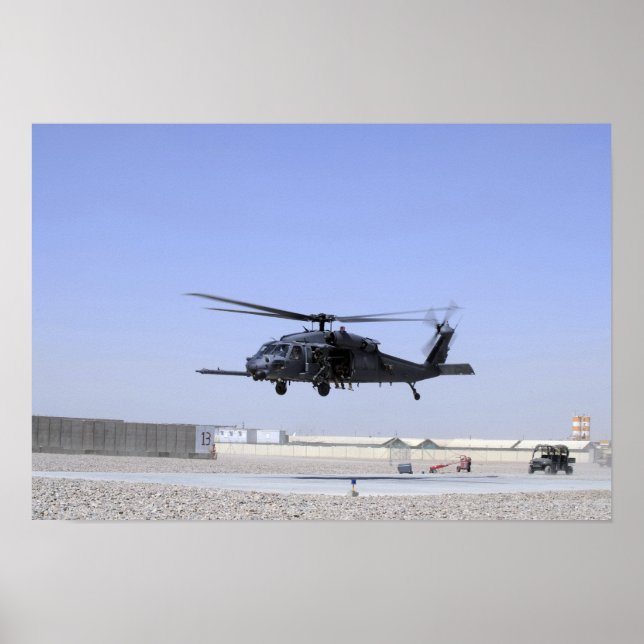 Affiche An HH-60G Pave Hawk taking off from Camp Bastio (Devant)