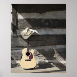Affiche Cowboy casquette sur guitare s'appuie sur le cabin