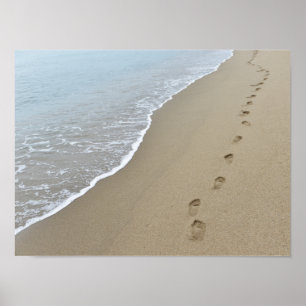 Affiche Des empreintes de pieds dans le sable.