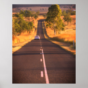 Affiche Encore sur la route une longue étendue de route su
