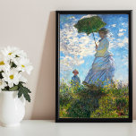 Affiche Femme avec parasol - Madame Monet et son fils<br><div class="desc">A son plus pur, l'impressionnisme était à l'écoute de la peinture paysagère, un sujet que Monet privilégiait. Dans Femme avec un parasol - Madame Monet et Son Fils, son talent de peintre artistique est tout aussi évident. L'artiste avait l'intention de transmettre le sentiment d'une sortie familiale décontractée plutôt qu'un portrait...</div>