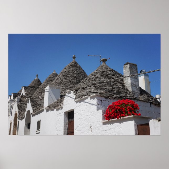 Affiche Fleurs de géranium et maisons de trulli à Alberobe (Devant)