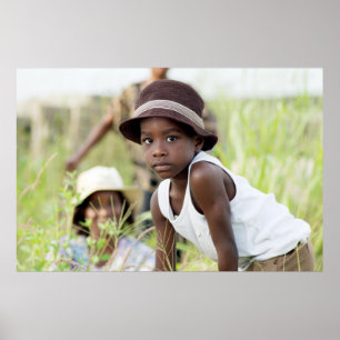 Affiche Injured child in the grass.