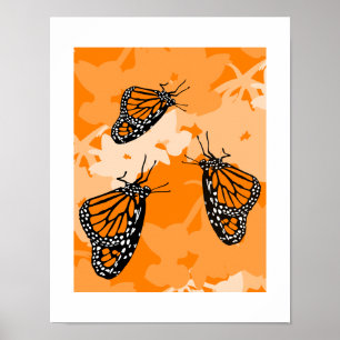 Affiche Joli trio de papillons monarques sur une plante de