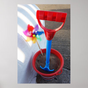 Affiche Jouets de plage aux couleurs vives