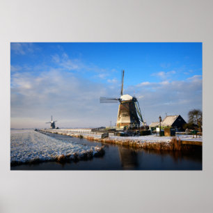 Affiche Moulin à vent dans la neige dans un paysage hivern