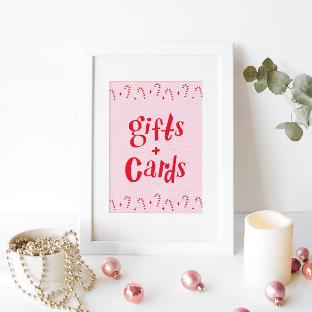 Affiche Oh quel plaisir Sucre de canne Rose cadeaux et Car (gifts and cards sign with candy canes on pink background. Shown in a white frame
)