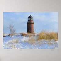 Phare de Sturdy sur une côte rocheuse en hiver
