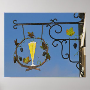 Affiche Une enseigne en fer forgé qui illustre le thème