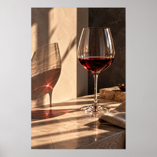 Affiche Verre à vin rouge dans la lumière dorée du soleil