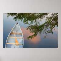Canot sur le lac au coucher du soleil, Canada