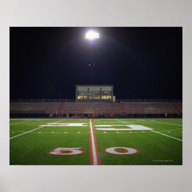 Affiches Illuminated American football field at night (Devant)