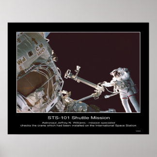 Affiches L'astronaute Jeffrey N. Williams vérifie la grue