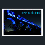 Affiches Le Pont du Gard Pont Aqueduct, Paris France<br><div class="desc">Photographie du Pont du Gard - un ancien pont d'aqueduc romain qui traverse le Gardon à Vers-Pont-du-Gard,  France - illuminé de lumière bleue.</div>