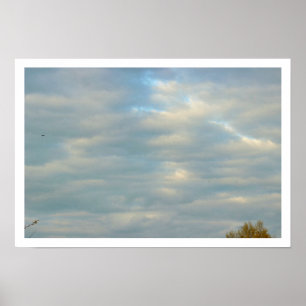 Affiches Puits de soleil à travers l'affiche des nuages