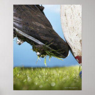 Affiches Rugby player kicking ball off tee, close up of