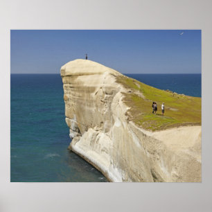 Affiches Touristes au sommet de la falaise à Tunnel Beach
