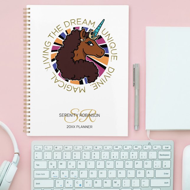 Afro Unicorn Living the Dream Design (Planner on table)