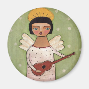 Aimant Ange jouant la guitare