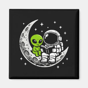 Aimant Astronaute lisant un livre extraterrestre lune esp