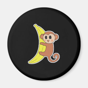 Aimant bébé singe mignon sur une banane