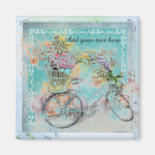 Aimant Bicyclette avec paniers à fleurs sur robinet bleu