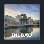 Aimant Bilbao Guggenheim Museum Travel<br><div class="desc">Le musée Guggenheim Bilbao, situé dans le Pays basque du nord de l'Espagne, est l'un des musées d'art contemporain les plus remarquables du monde. Conçu par le célèbre architecte Frank Gehry, la structure curviligne futuriste du musée est en titane, en verre et en calcaire, créant un jeu époustouflant de lumière...</div>