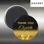 Aimant Black gold elegant Thank You birthday name<br><div class="desc">Elegant,  classic,  glamorous and feminine.  A gold colored bow with golden glitter and sparkle,  a bit of bling and luxury.  Black background. With the text: Thank You! and template for a name.</div>