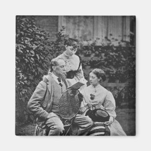 Aimant Charles Dickens avec deux de ses filles