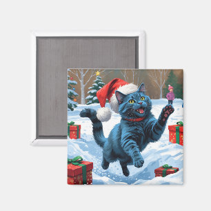 Aimant Chat Bleu Russe Courant dans la Neige avec un Chap