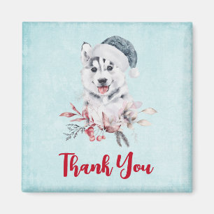 Aimant Chien Husky de Noël dans un chapeau de Père Noël M