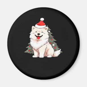 Aimant Chien mignon portant chapeau de Père Noël et arbre