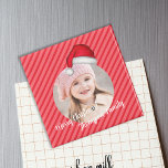 Aimant Christmas mignon photo Santa Hat Whimsical<br><div class="desc">Ce design comprend une photo de Noël magnétique, un joli joyeux et fantaisiste amusant, un modèle circulaire photo, un simple casquette rouge du Père Noël, une fête festive, rayures rayées rouge vif, un aimant frigo personnalisé, décoration de Noël créative, une idée cadeau d'humour classique amusant, un grand pot de Noël...</div>