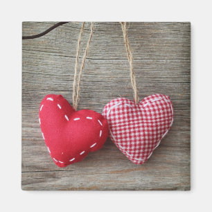 Aimant Coeurs rouges sur le tableau en bois 2